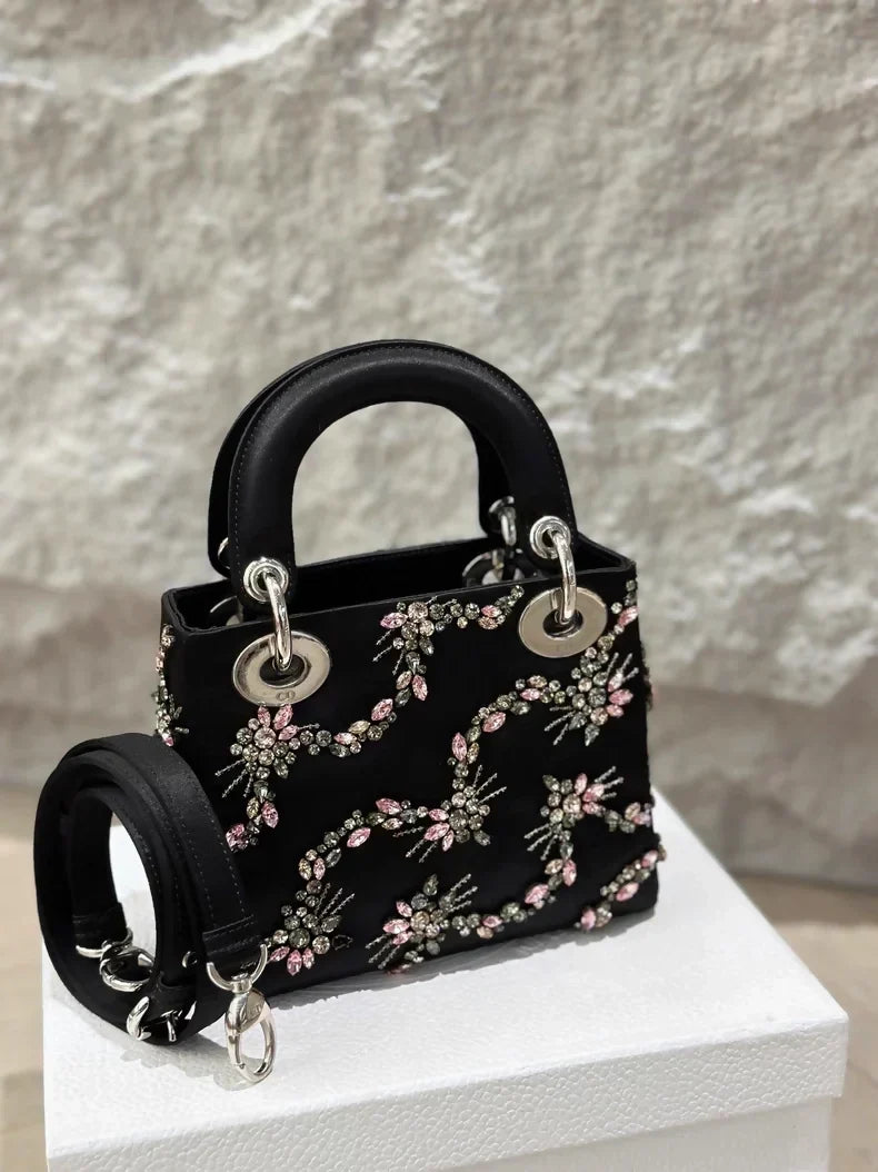 Lady Dior small black silk embroidery bag with silver hardware